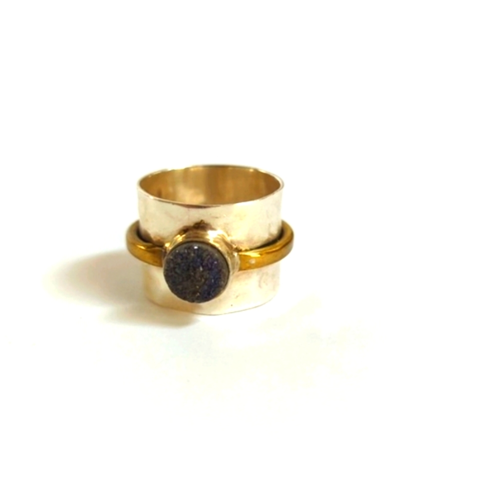 Wide silver, brass and blue stone ring